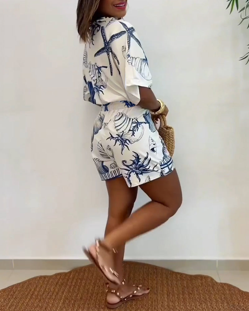 Starfish and Seashell Print V-Neck Half Sleeve Wrap Knot Romper | Meave & Ivy
