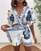 Starfish and Seashell Print V-Neck Half Sleeve Wrap Knot Romper | Meave & Ivy
