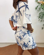 Starfish and Seashell Print V-Neck Half Sleeve Wrap Knot Romper | Meave & Ivy