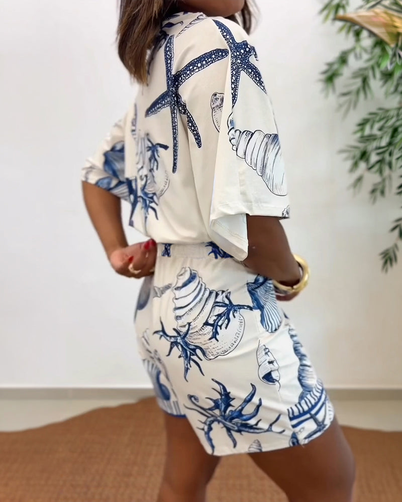 Starfish and Seashell Print V-Neck Half Sleeve Wrap Knot Romper | Meave & Ivy