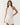 Halter Neck Pleated Playsuit with Ruffle Overlay