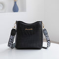 Women's Compact Crossbody Bag with Textured Finish and Wide Strap