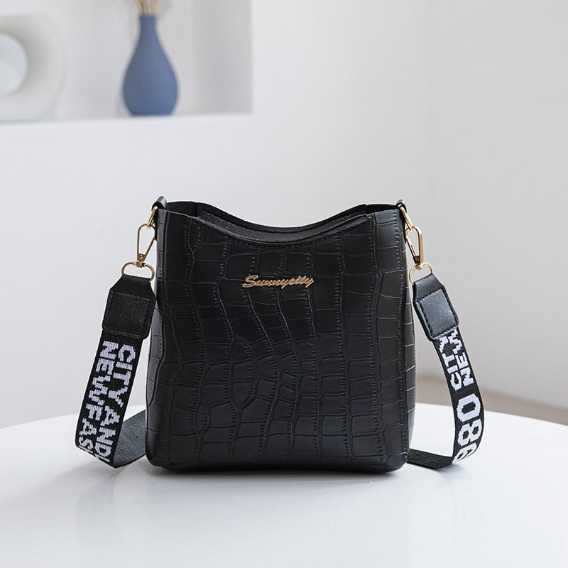 Women's Compact Crossbody Bag with Textured Finish and Wide Strap