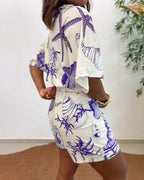 Starfish and Seashell Print V-Neck Half Sleeve Wrap Knot Romper | Meave & Ivy