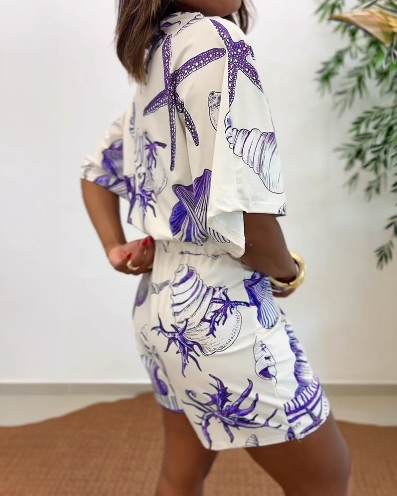 Starfish and Seashell Print V-Neck Half Sleeve Wrap Knot Romper | Meave & Ivy